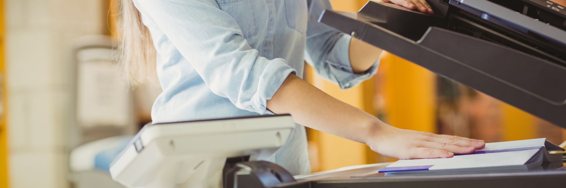 employee using leased photocopier